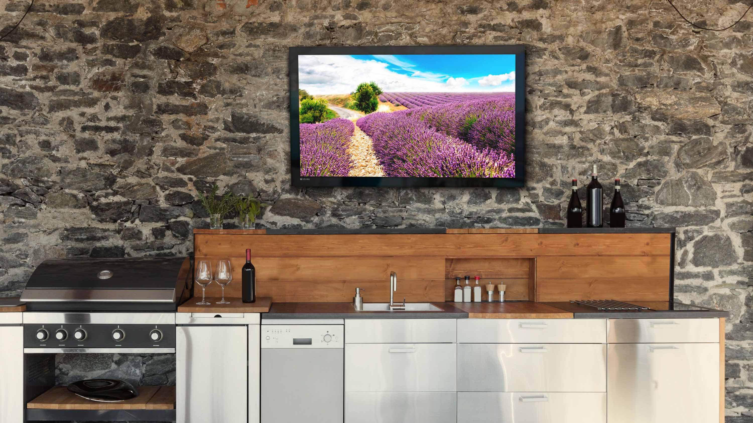 stainless silver kitchen outdoors underneath a storm seura tv