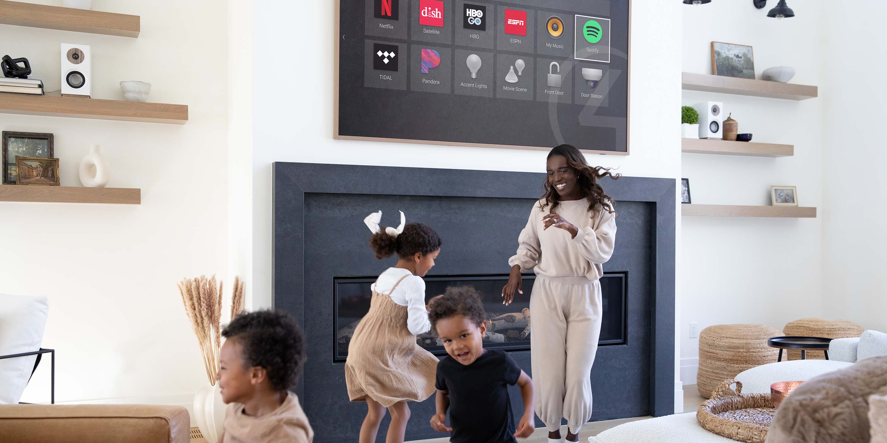 Control4 Touch panel in a able with a traditional home in the background