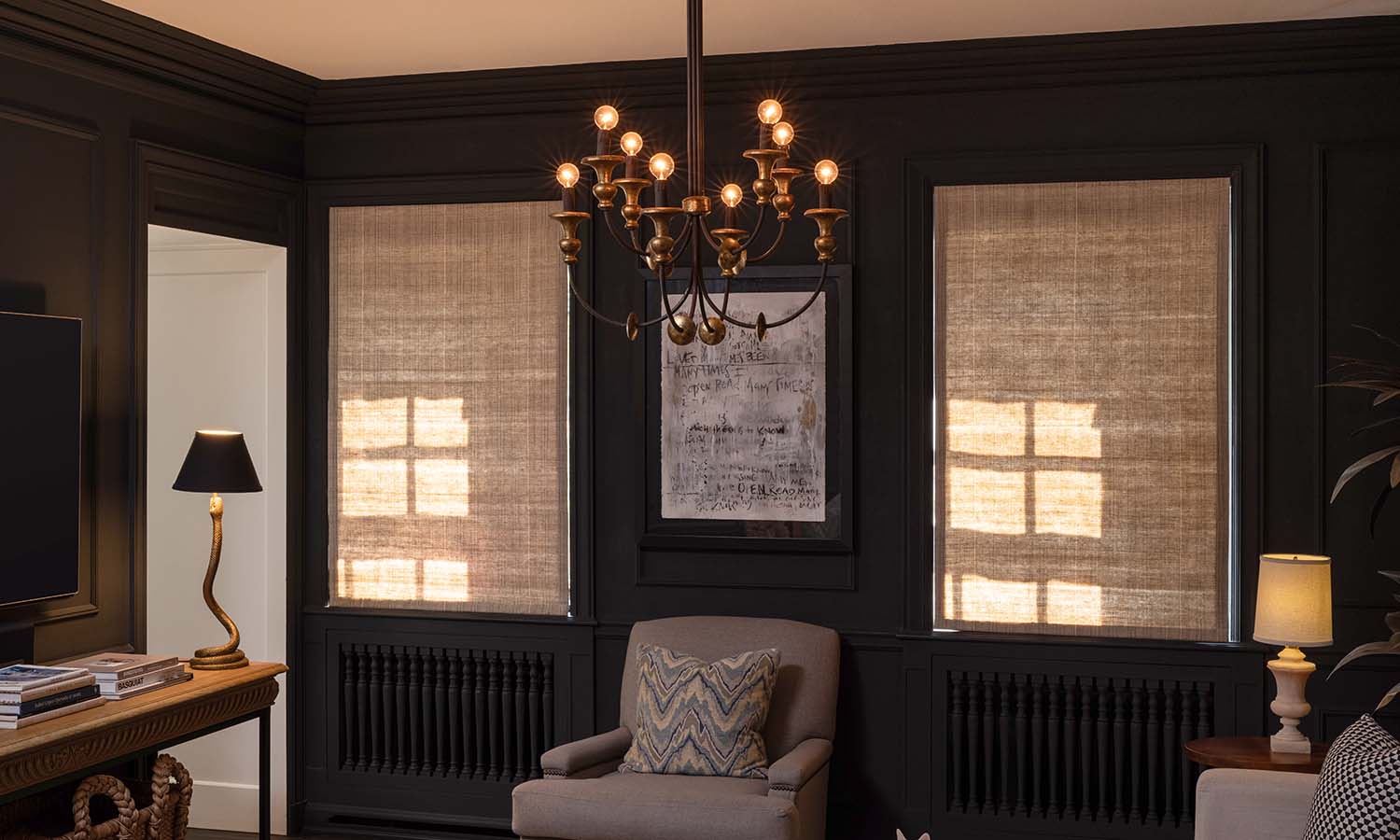 Josh AI Touch panel in a able with a traditional home in the background