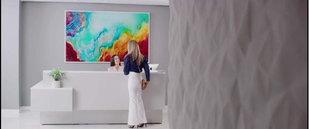 Woman at a front desk